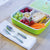 Gorgeous food photography: eSeasons Bento Lunchbox in Green with appetizing lunch including carrot, fruit & sandwich